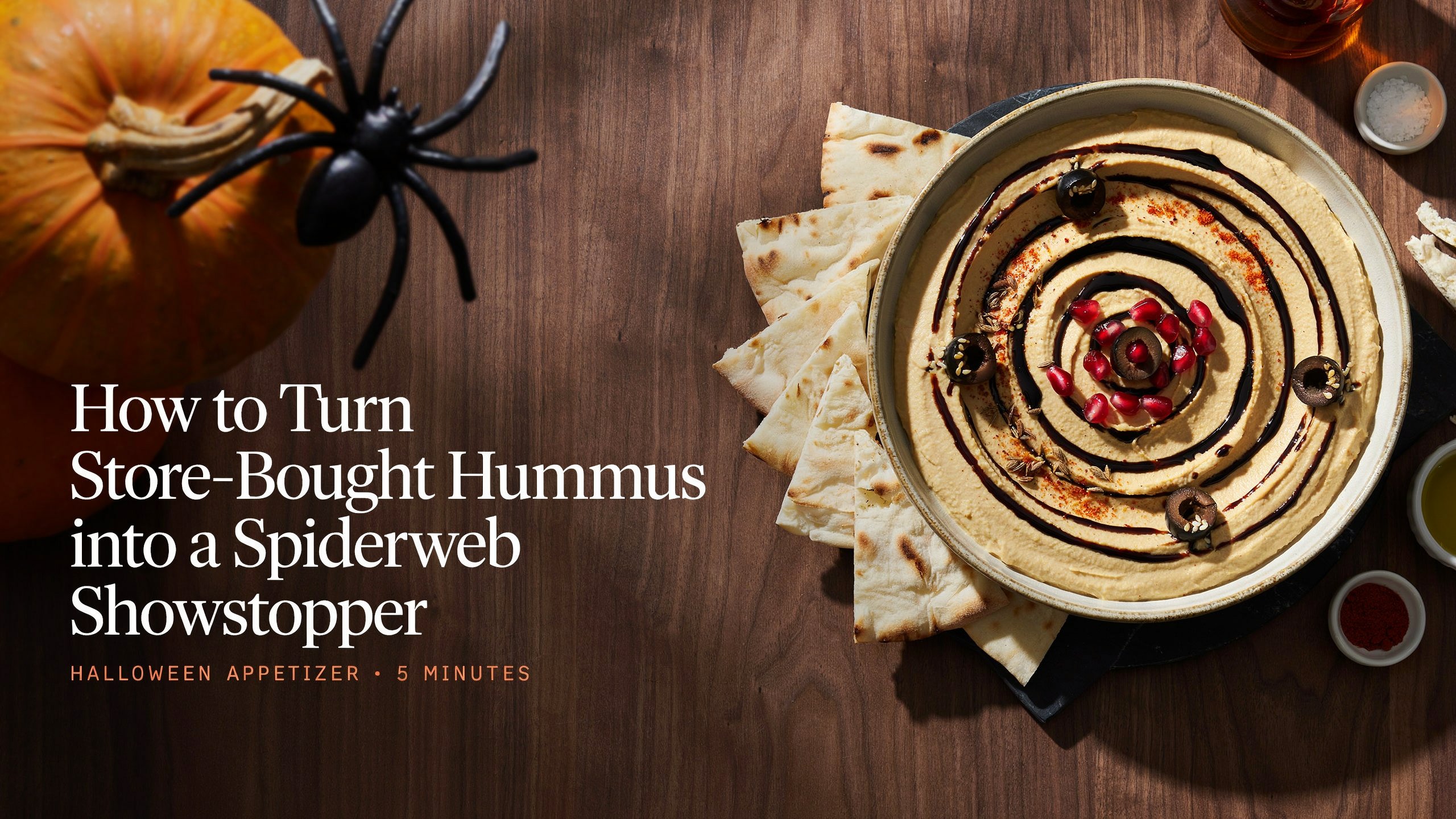 The easiest way to add instant Halloween flair to any party table is with a simple dip transformation. Take a tub of store-bought hummus (roasted red pepper works best for color contrast) and turn it into a creepy spiderweb centerpiece using sour cream and a toothpick 